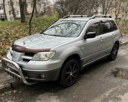 Сірий Міцубісі Аутлендер, об'ємом двигуна 2 л та пробігом 332 тис. км за 6200 $, фото 6 на Automoto.ua