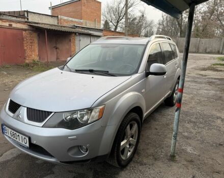 Серый Мицубиси Аутлендер, объемом двигателя 2.4 л и пробегом 330 тыс. км за 9000 $, фото 4 на Automoto.ua