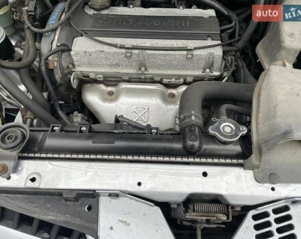 Серый Мицубиси Аутлендер, объемом двигателя 2 л и пробегом 270 тыс. км за 7000 $, фото 14 на Automoto.ua