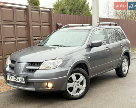 Серый Мицубиси Аутлендер, объемом двигателя 2.4 л и пробегом 240 тыс. км за 6900 $, фото 3 на Automoto.ua