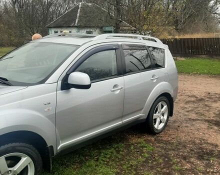 Серый Мицубиси Аутлендер, объемом двигателя 3 л и пробегом 183 тыс. км за 9200 $, фото 4 на Automoto.ua