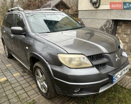Серый Мицубиси Аутлендер, объемом двигателя 2 л и пробегом 380 тыс. км за 3700 $, фото 3 на Automoto.ua