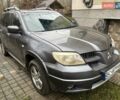 Серый Мицубиси Аутлендер, объемом двигателя 2 л и пробегом 380 тыс. км за 3700 $, фото 3 на Automoto.ua