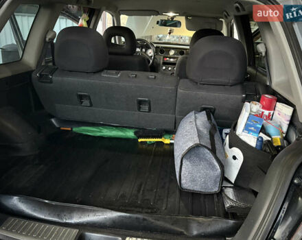 Серый Мицубиси Аутлендер, объемом двигателя 2.38 л и пробегом 238 тыс. км за 7450 $, фото 58 на Automoto.ua