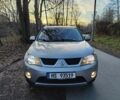Сірий Міцубісі Аутлендер, об'ємом двигуна 0 л та пробігом 320 тис. км за 4049 $, фото 1 на Automoto.ua