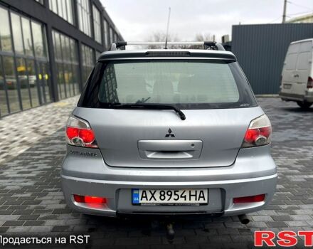 Серый Мицубиси Аутлендер, объемом двигателя 2.4 л и пробегом 280 тыс. км за 5800 $, фото 12 на Automoto.ua