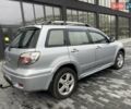 Серый Мицубиси Аутлендер, объемом двигателя 2.38 л и пробегом 280 тыс. км за 5800 $, фото 12 на Automoto.ua