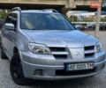 Серый Мицубиси Аутлендер, объемом двигателя 2.38 л и пробегом 299 тыс. км за 7300 $, фото 2 на Automoto.ua