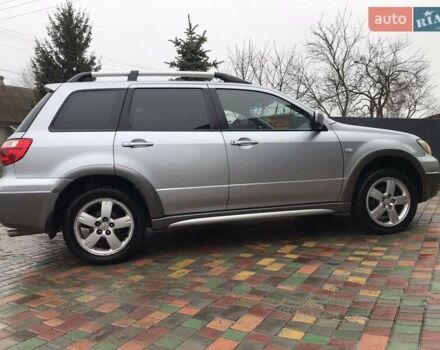 Сірий Міцубісі Аутлендер, об'ємом двигуна 2.4 л та пробігом 167 тис. км за 6400 $, фото 3 на Automoto.ua