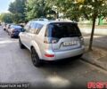 Серый Мицубиси Аутлендер, объемом двигателя 3 л и пробегом 192 тыс. км за 9800 $, фото 3 на Automoto.ua