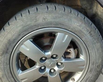 Серый Мицубиси Аутлендер, объемом двигателя 2.38 л и пробегом 189 тыс. км за 7600 $, фото 15 на Automoto.ua