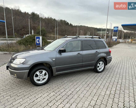 Серый Мицубиси Аутлендер, объемом двигателя 2 л и пробегом 196 тыс. км за 6450 $, фото 45 на Automoto.ua