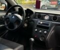 Серый Мицубиси Аутлендер, объемом двигателя 2.38 л и пробегом 299 тыс. км за 7300 $, фото 15 на Automoto.ua