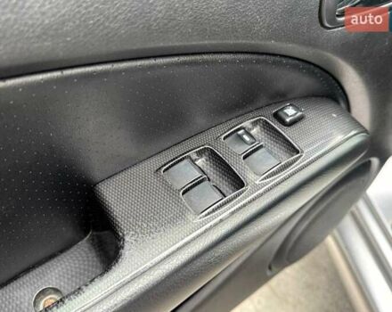 Сірий Міцубісі Аутлендер, об'ємом двигуна 2.38 л та пробігом 245 тис. км за 5990 $, фото 17 на Automoto.ua