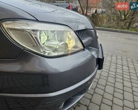 Сірий Міцубісі Аутлендер, об'ємом двигуна 2.38 л та пробігом 267 тис. км за 6300 $, фото 16 на Automoto.ua