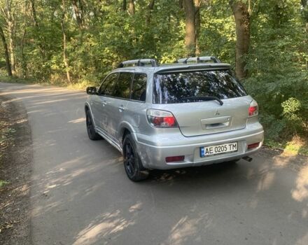 Сірий Міцубісі Аутлендер, об'ємом двигуна 2.4 л та пробігом 307 тис. км за 6700 $, фото 3 на Automoto.ua