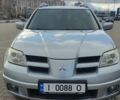 Сірий Міцубісі Аутлендер, об'ємом двигуна 2.4 л та пробігом 170 тис. км за 6400 $, фото 17 на Automoto.ua