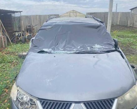 Серый Мицубиси Аутлендер, объемом двигателя 1.97 л и пробегом 250 тыс. км за 4000 $, фото 1 на Automoto.ua