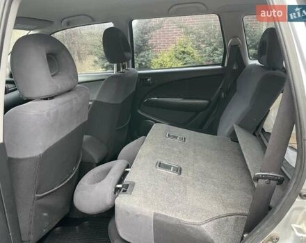 Серый Мицубиси Аутлендер, объемом двигателя 2 л и пробегом 270 тыс. км за 7000 $, фото 8 на Automoto.ua