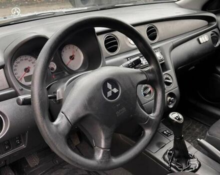 Сірий Міцубісі Аутлендер, об'ємом двигуна 2 л та пробігом 332 тис. км за 6200 $, фото 11 на Automoto.ua