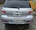 Серый Мицубиси Аутлендер, объемом двигателя 2.4 л и пробегом 300 тыс. км за 5900 $, фото 6 на Automoto.ua