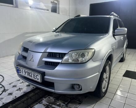 Серый Мицубиси Аутлендер, объемом двигателя 2.4 л и пробегом 300 тыс. км за 5999 $, фото 7 на Automoto.ua