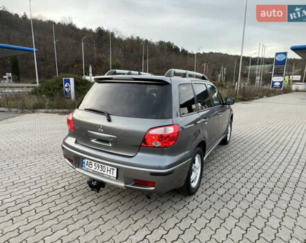 Серый Мицубиси Аутлендер, объемом двигателя 2 л и пробегом 196 тыс. км за 6450 $, фото 5 на Automoto.ua