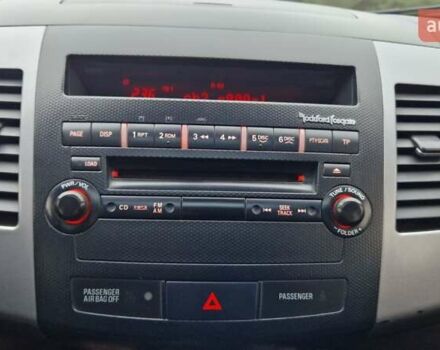 Серый Мицубиси Аутлендер, объемом двигателя 3 л и пробегом 197 тыс. км за 9500 $, фото 23 на Automoto.ua