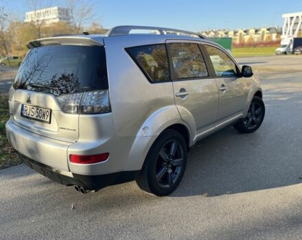 Серый Мицубиси Аутлендер, объемом двигателя 2 л и пробегом 255 тыс. км за 3935 $, фото 2 на Automoto.ua