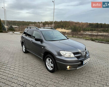 Серый Мицубиси Аутлендер, объемом двигателя 2 л и пробегом 196 тыс. км за 6450 $, фото 4 на Automoto.ua