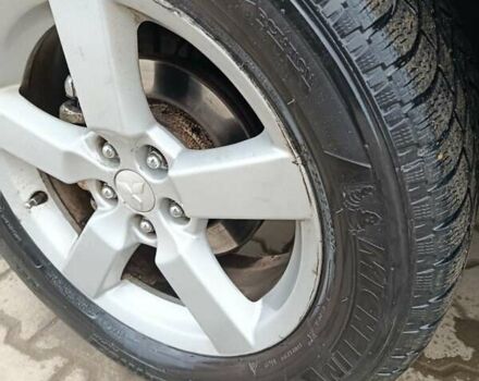 Серый Мицубиси Аутлендер, объемом двигателя 2 л и пробегом 332 тыс. км за 7650 $, фото 5 на Automoto.ua