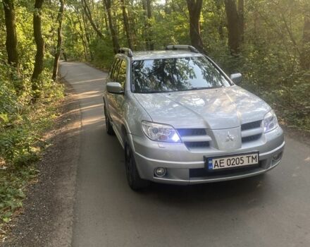 Сірий Міцубісі Аутлендер, об'ємом двигуна 2.4 л та пробігом 307 тис. км за 6700 $, фото 2 на Automoto.ua