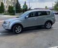 Серый Мицубиси Аутлендер, объемом двигателя 2.36 л и пробегом 335 тыс. км за 9000 $, фото 5 на Automoto.ua