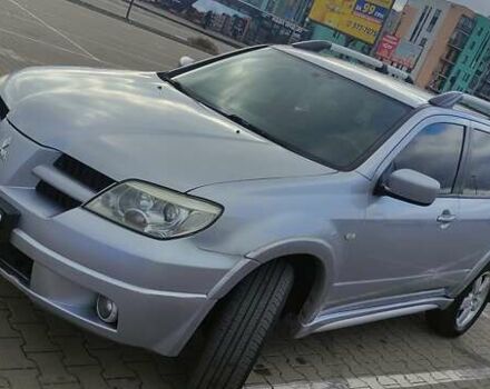 Сірий Міцубісі Аутлендер, об'ємом двигуна 2.4 л та пробігом 170 тис. км за 6400 $, фото 16 на Automoto.ua