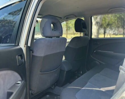 Серый Мицубиси Аутлендер, объемом двигателя 2 л и пробегом 270 тыс. км за 7999 $, фото 5 на Automoto.ua