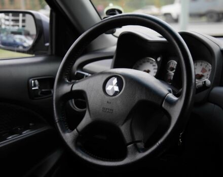 Серый Мицубиси Аутлендер, объемом двигателя 2.4 л и пробегом 240 тыс. км за 7200 $, фото 14 на Automoto.ua