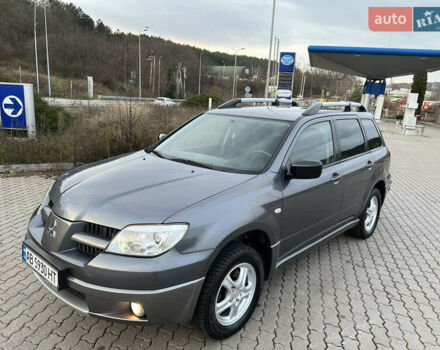 Серый Мицубиси Аутлендер, объемом двигателя 2 л и пробегом 196 тыс. км за 6450 $, фото 32 на Automoto.ua