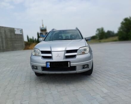 Серый Мицубиси Аутлендер, объемом двигателя 2.4 л и пробегом 243 тыс. км за 6200 $, фото 2 на Automoto.ua