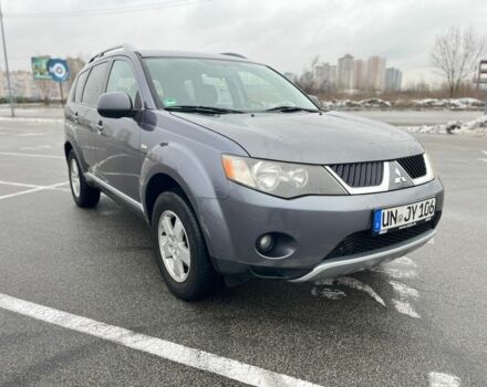 Серый Мицубиси Аутлендер, объемом двигателя 2 л и пробегом 235 тыс. км за 4800 $, фото 3 на Automoto.ua