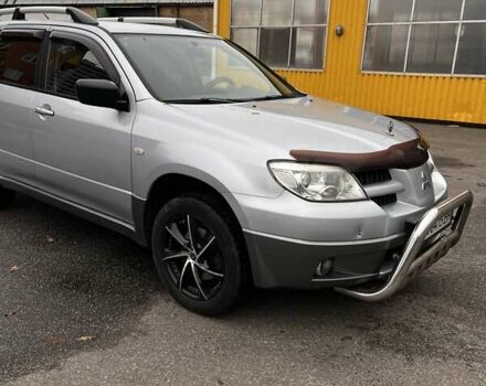 Сірий Міцубісі Аутлендер, об'ємом двигуна 2 л та пробігом 332 тис. км за 6200 $, фото 15 на Automoto.ua