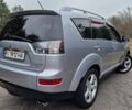 Серый Мицубиси Аутлендер, объемом двигателя 3 л и пробегом 197 тыс. км за 9500 $, фото 1 на Automoto.ua