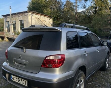 Серый Мицубиси Аутлендер, объемом двигателя 2 л и пробегом 190 тыс. км за 5300 $, фото 3 на Automoto.ua