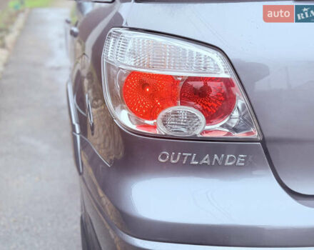 Серый Мицубиси Аутлендер, объемом двигателя 2.4 л и пробегом 240 тыс. км за 6900 $, фото 59 на Automoto.ua