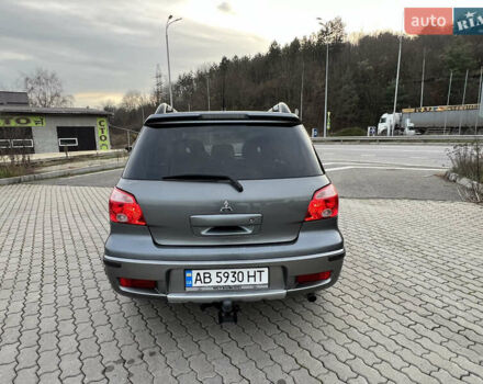 Серый Мицубиси Аутлендер, объемом двигателя 2 л и пробегом 196 тыс. км за 6450 $, фото 46 на Automoto.ua
