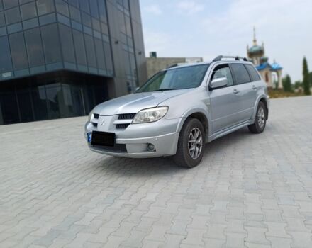 Серый Мицубиси Аутлендер, объемом двигателя 2.4 л и пробегом 243 тыс. км за 6200 $, фото 5 на Automoto.ua
