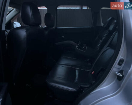 Серый Мицубиси Аутлендер, объемом двигателя 2.4 л и пробегом 236 тыс. км за 7600 $, фото 32 на Automoto.ua