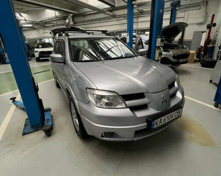 Серый Мицубиси Аутлендер, объемом двигателя 2.38 л и пробегом 238 тыс. км за 7450 $, фото 50 на Automoto.ua