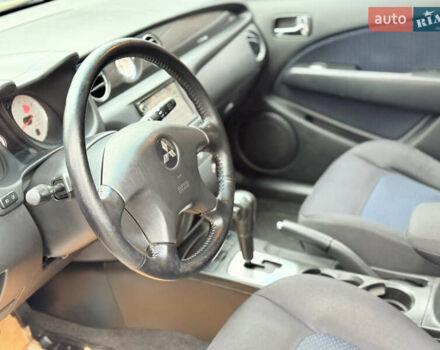 Серый Мицубиси Аутлендер, объемом двигателя 2.4 л и пробегом 240 тыс. км за 6900 $, фото 4 на Automoto.ua