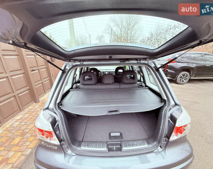 Серый Мицубиси Аутлендер, объемом двигателя 2.4 л и пробегом 240 тыс. км за 6900 $, фото 62 на Automoto.ua