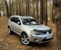 Серый Мицубиси Аутлендер, объемом двигателя 3 л и пробегом 182 тыс. км за 8600 $, фото 1 на Automoto.ua